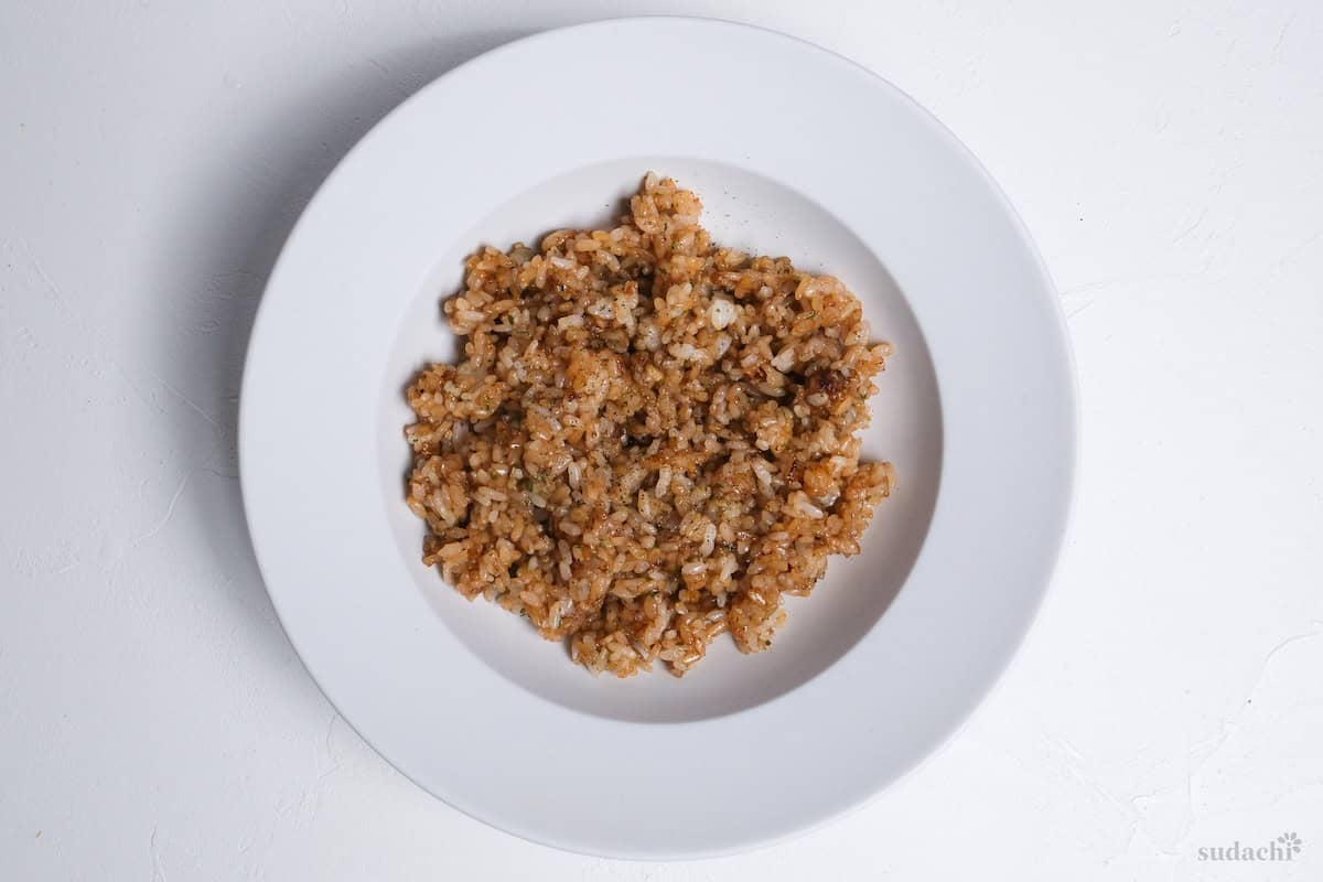 garlic fried rice in a white dish