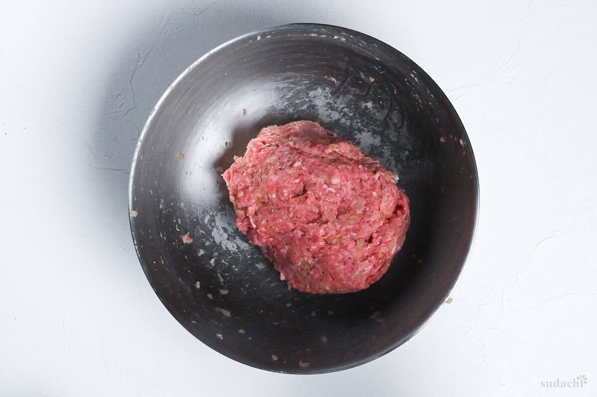kneaded hamburg mixture in a bowl