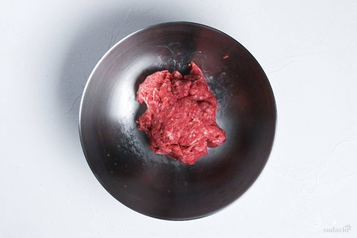 kneaded ground beef/pork mix in a bowl