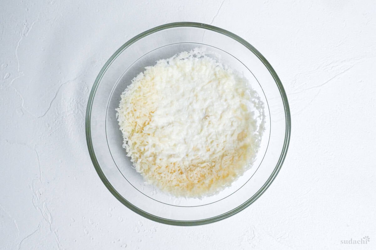 panko breadcrumbs and milk in a glass bowl