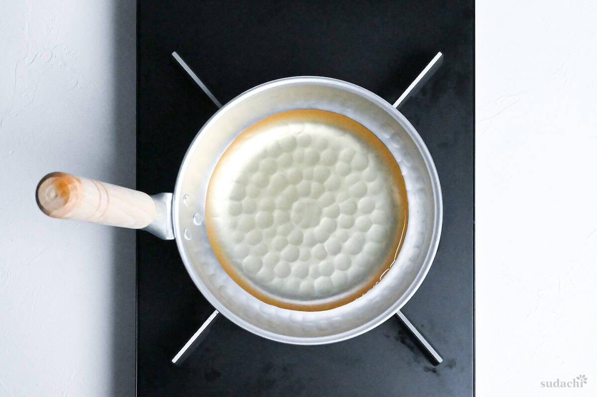 dashi in a Japanese style pan on the stove