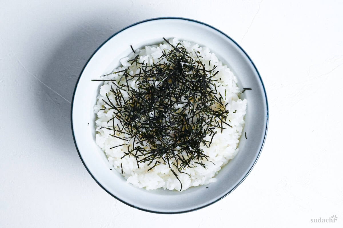 rice topped with kizami shredded nori in a bowl
