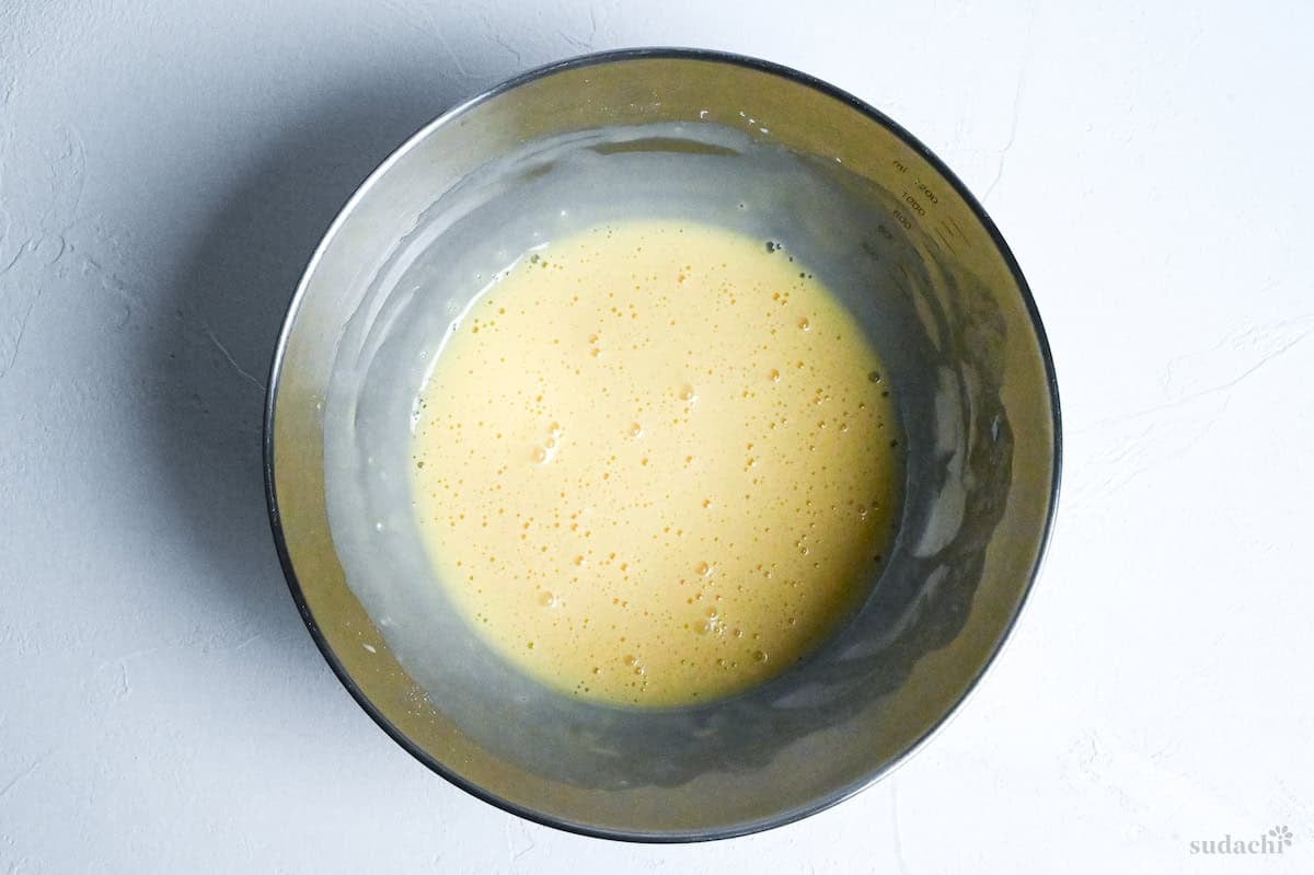 whisked egg and flour in a bowl