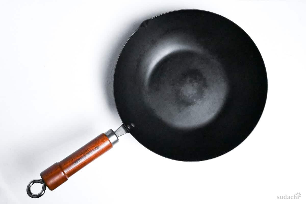 carbon steel wok on a white background