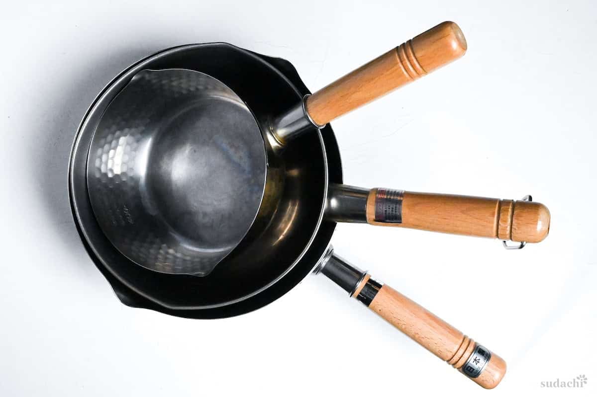 three yukihira pots (small, medium, large) stacked on a white background