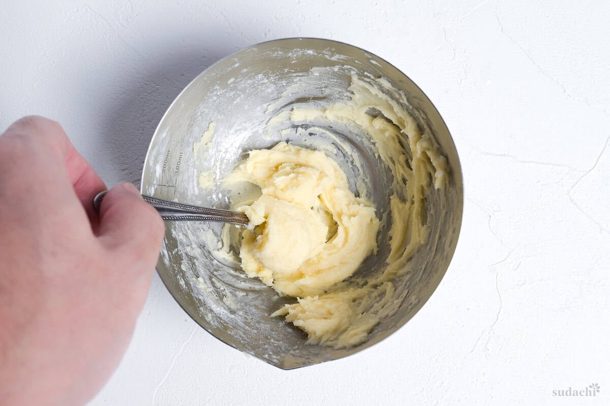 softened butter, white miso and flour mixed together in a small steel mixing bowl