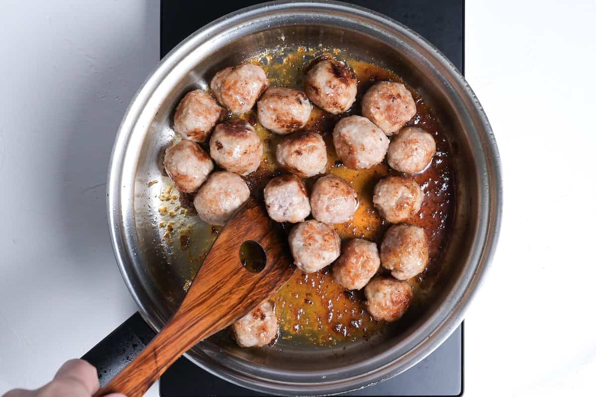 cooking pork meatballs in teriyaki sauce