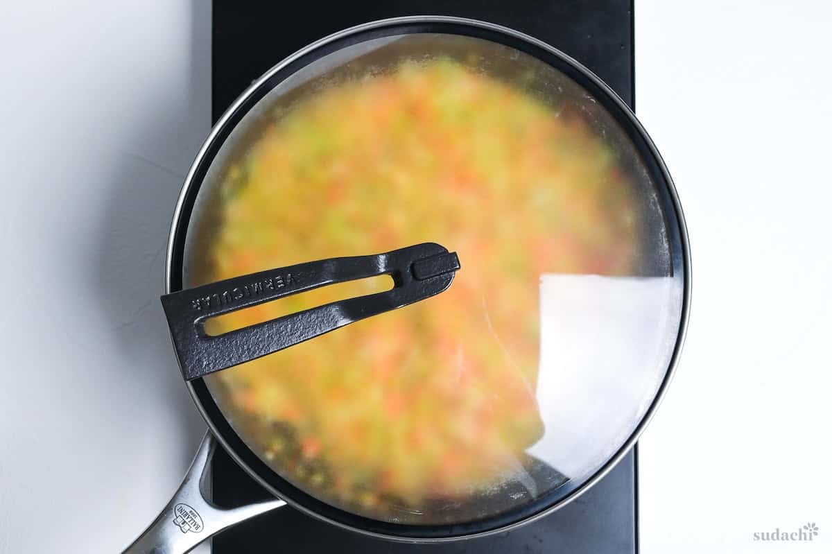 Making Soffrito in a pan covered with a lid