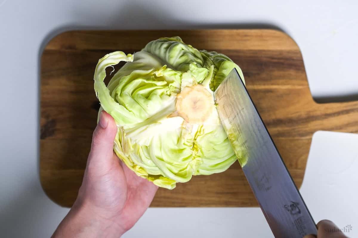 Cutting the root of Japanese green cabbage