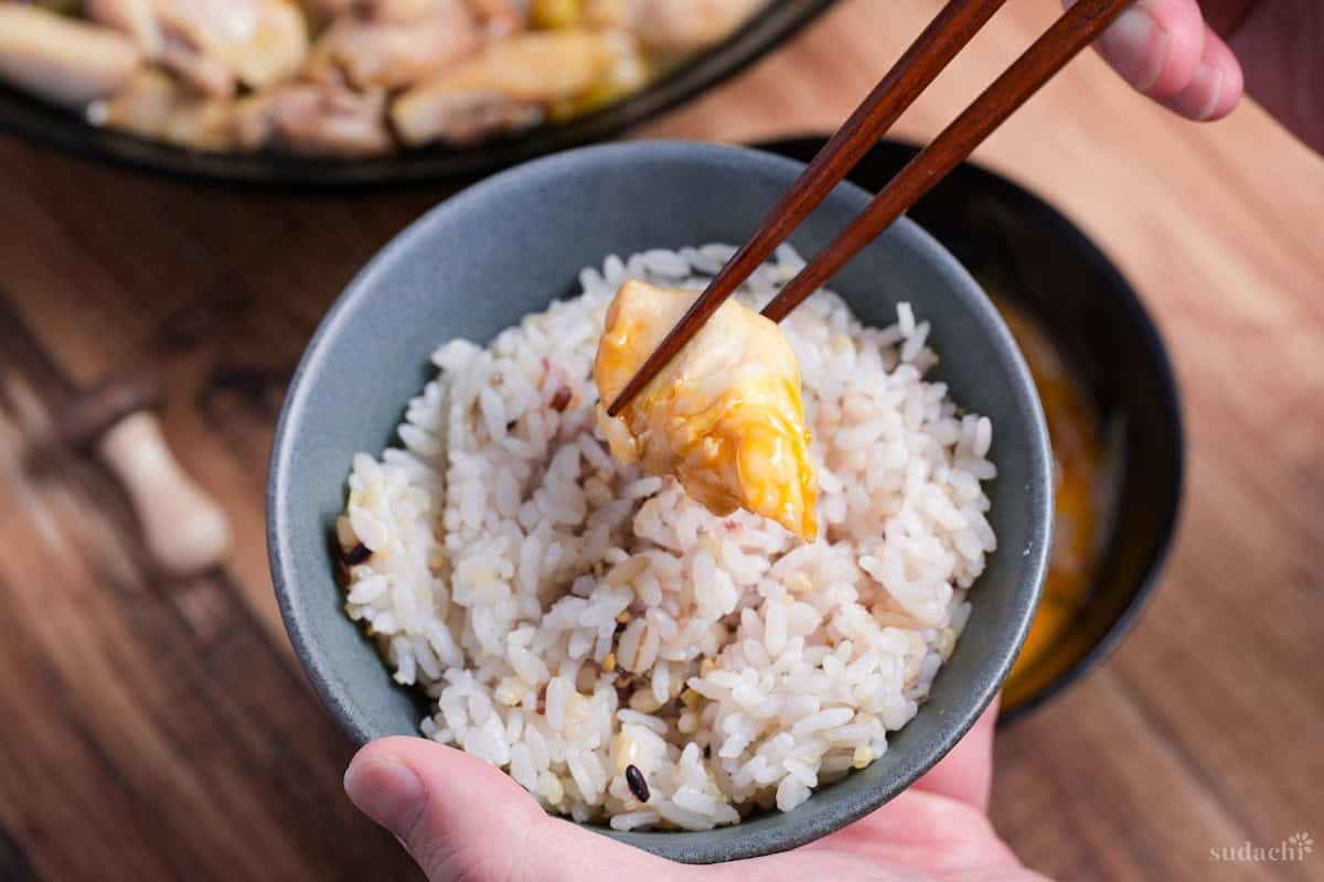 Chicken sukiyaki served with a bowl of Japanese mixed grain rice