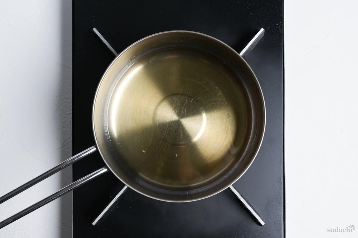 chicken sukiyaki sauce base in a sauce pan on the stove top