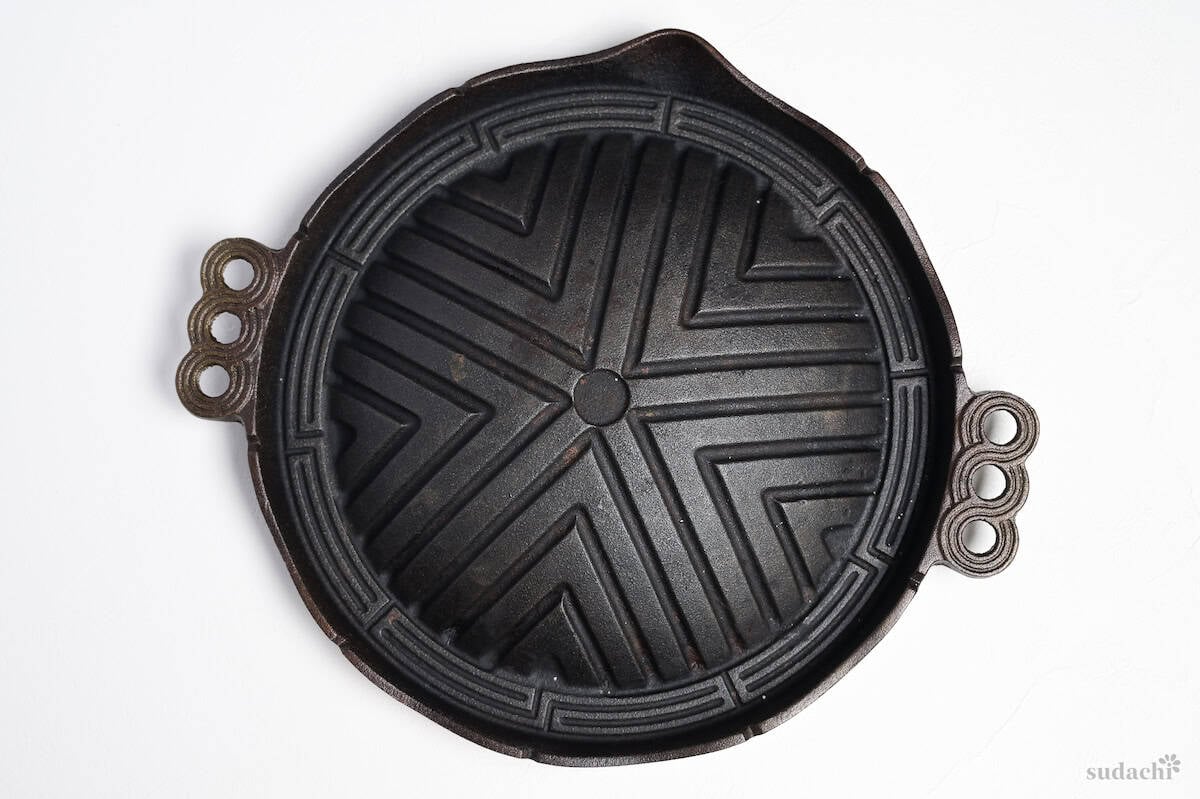 Grill for Jingisukan on a white background top down