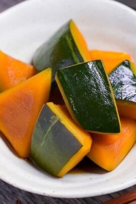 Kabocha Nimono (Japanese simmered pumpkin) in an off-white bowl
