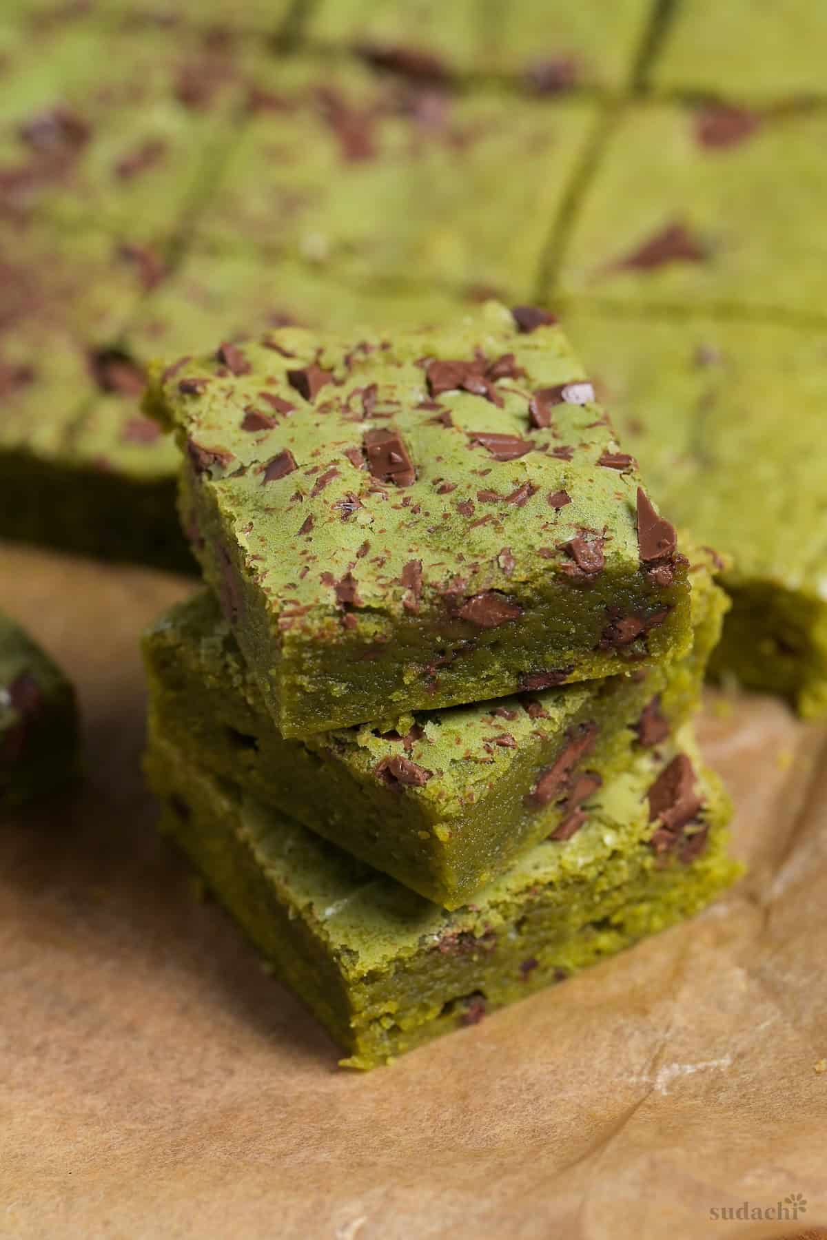 Three matcha blondies stacked on top of each other