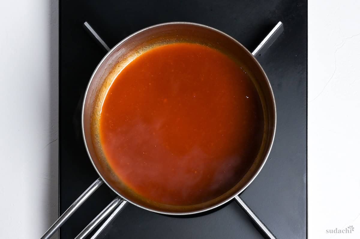 yakiniku sauce simmering in a pot on the stove top