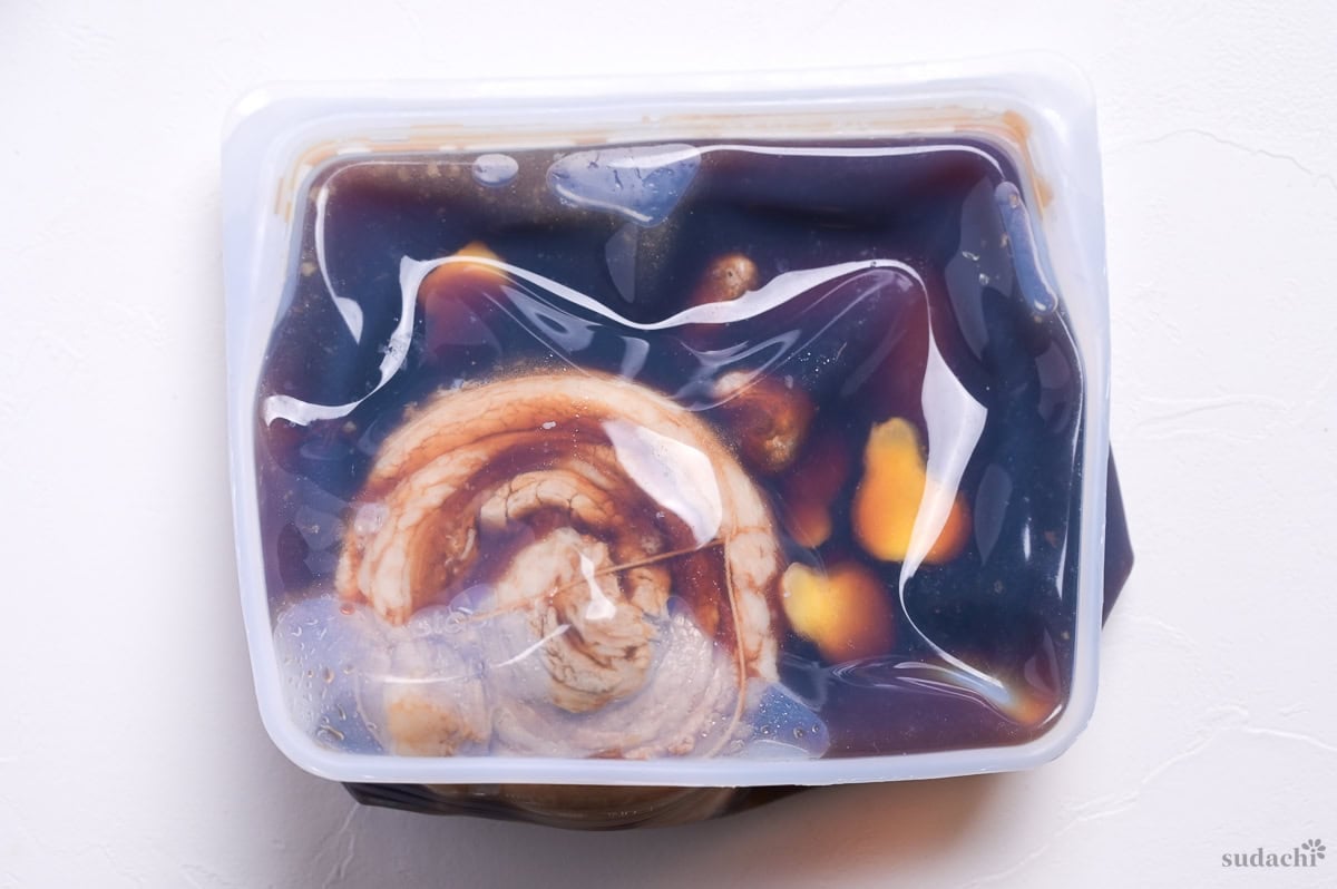 soaking rolled and simmered pork belly in marinade in a silicone bag to make chashu