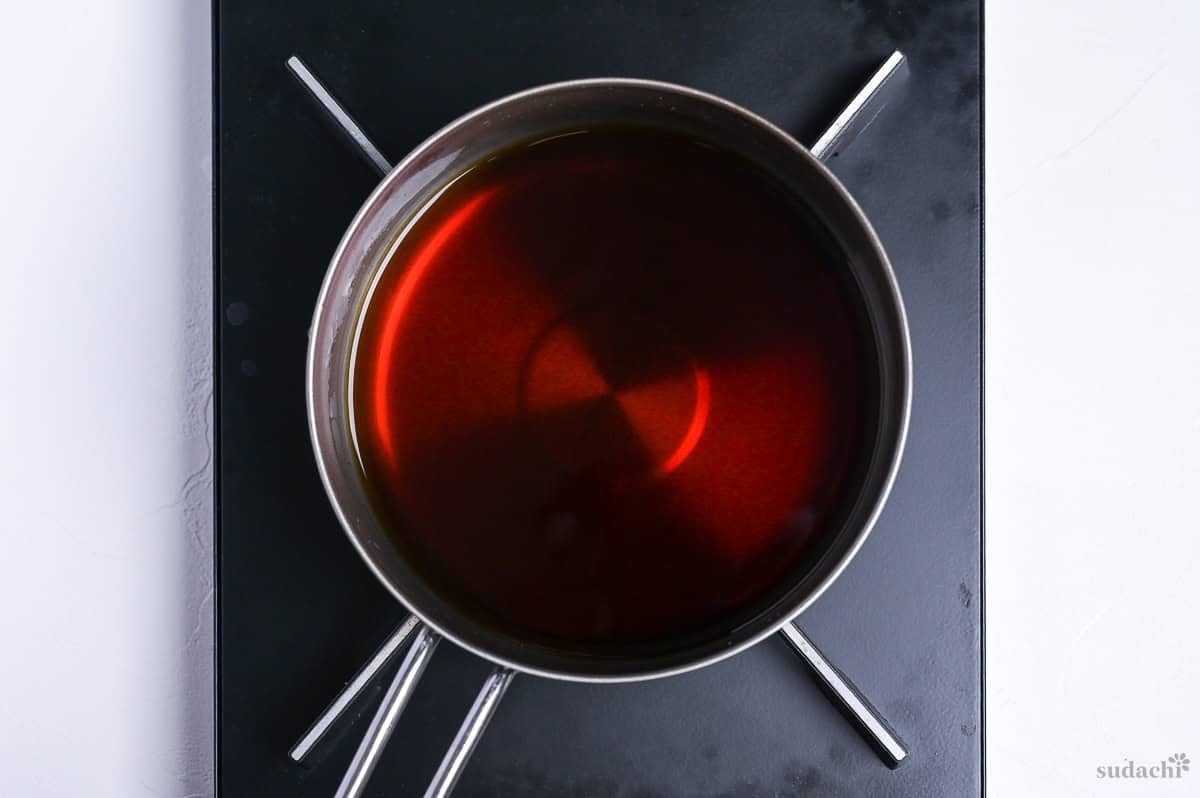 shoyu ramen tare in a pan on the stove