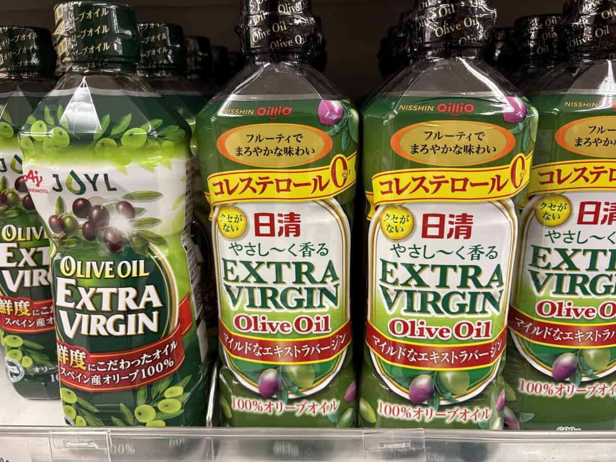 Extra virgin olive oil bottles on a Japanese supermarket shelf