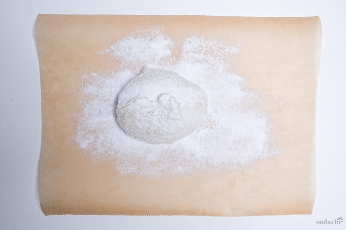 Daifuku rice flour dough (gyuhi) on parchment paper dusted with corn starch