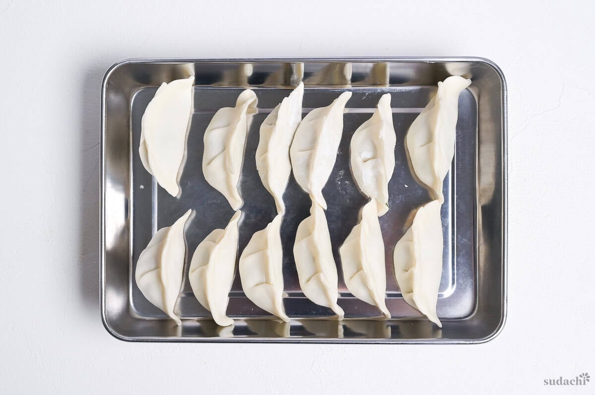 12 shaped gyoza made with homemade wrappers for gyoza soup