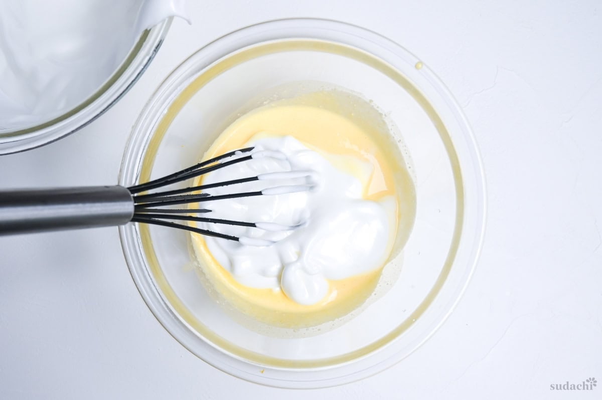 sacrifice meringue added to soufflé cheesecake base
