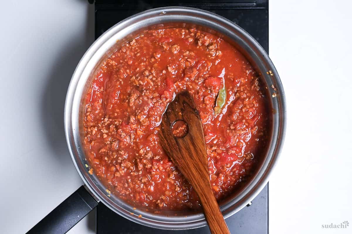 simmering Japanese spaghetti meat sauce in a pan on the stove top