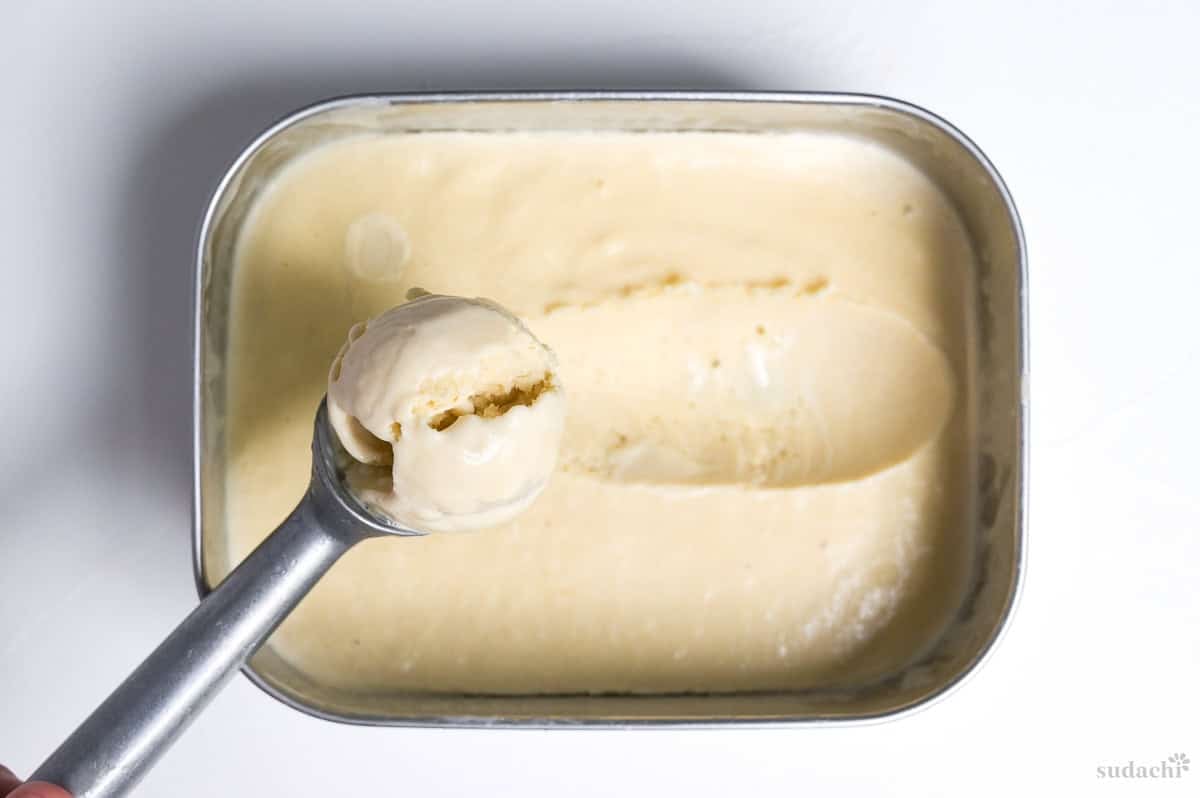 set hojicha ice cream on a metal ice cream scoop