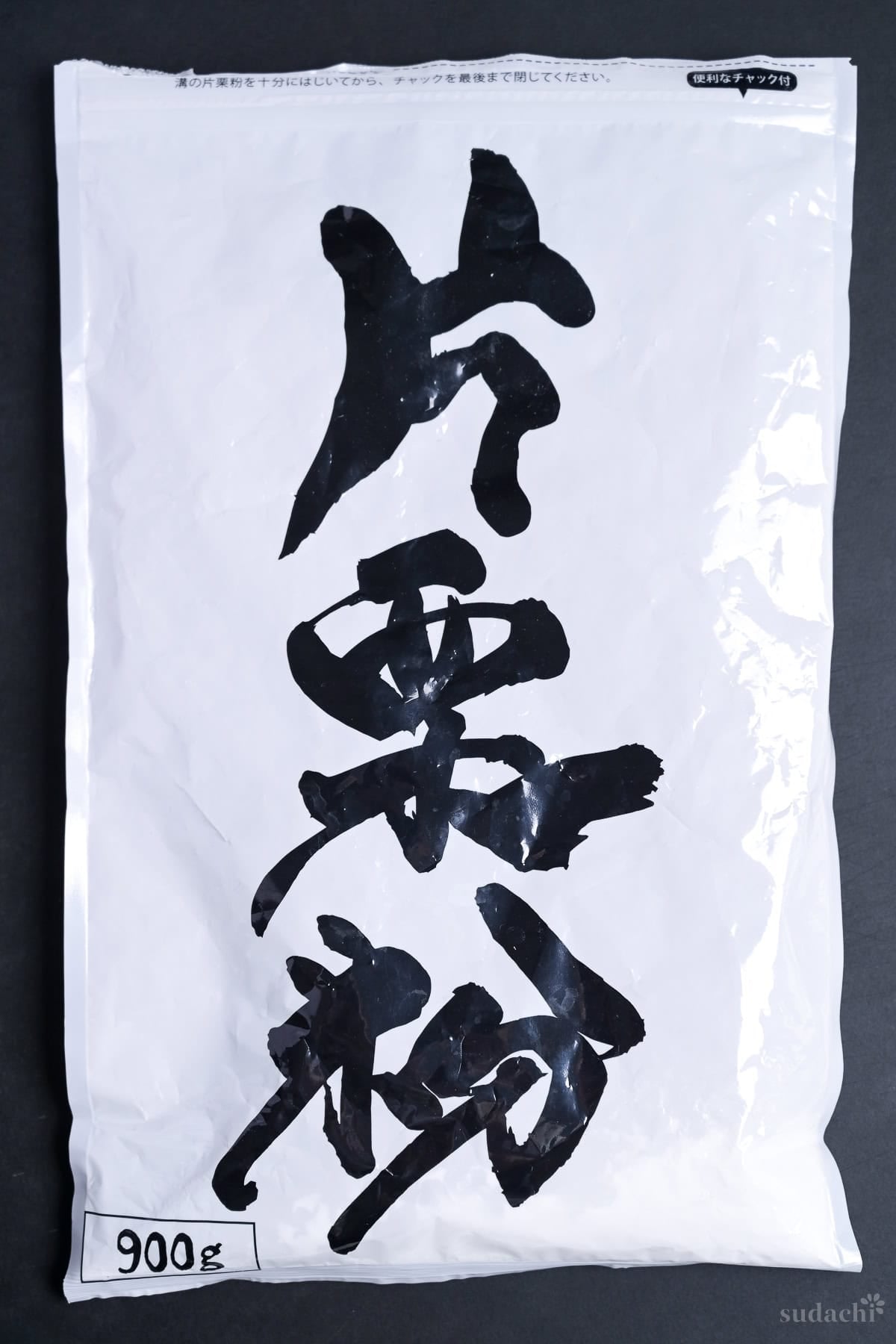 Japanese packet of potato starch (katakuriko packet) white packet with black kanji characters reading 片栗粉 on the front