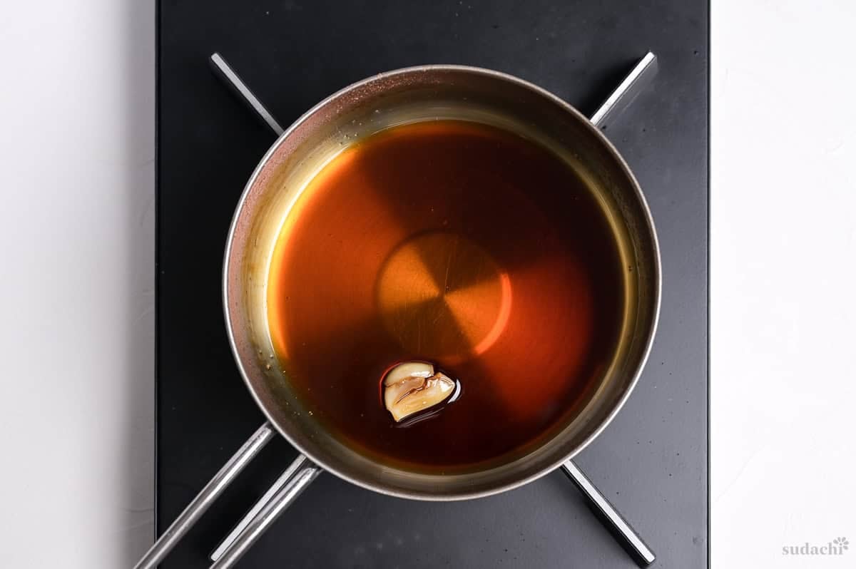 reduced tebasaki sauce in a saucepan on the stove top