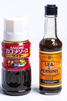 Bottles of Japanese Kagome usutā sauce and Lea & Perrins Worcestershire sauce side by side
