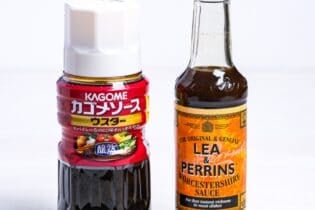 Bottles of Japanese Kagome usutā sauce and Lea & Perrins Worcestershire sauce side by side