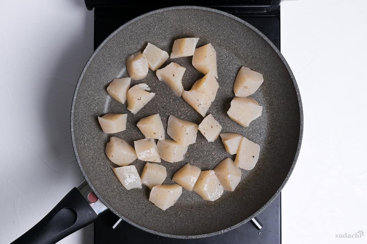roughly cut konnyaku in a frying pan