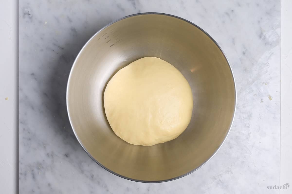 dough after rise, doubled in size in mixing bowl