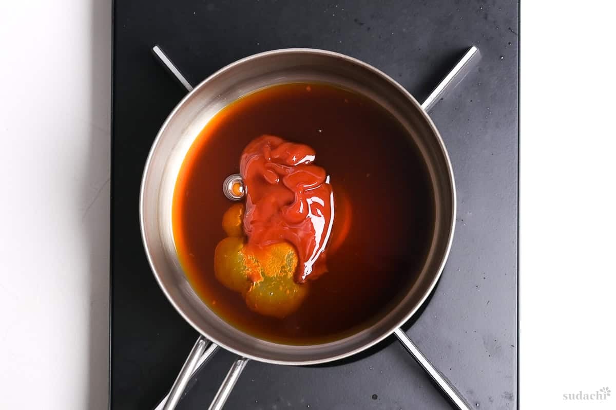 homemade katsu sauce ingredients in a pan on the stove top
