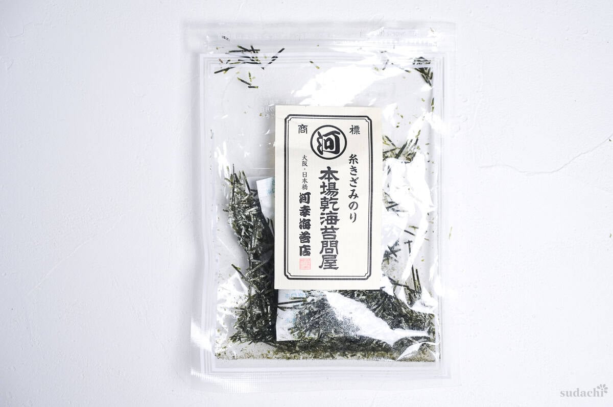 store-bought kizami (shredded) nori in packaging on a white background