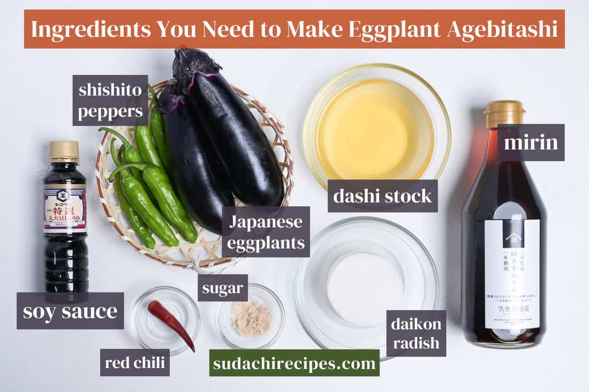 Ingredients needed to make agebitashi on a white background with labels. From left to right, top to bottom: shishito peppers, Japanese eggplants, dashi stock, mirin, soy sauce, red chili, sugar, daikon radish.