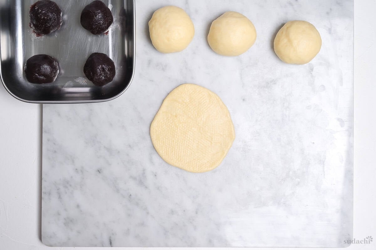 enriched dough rolled into a disc to make anpan