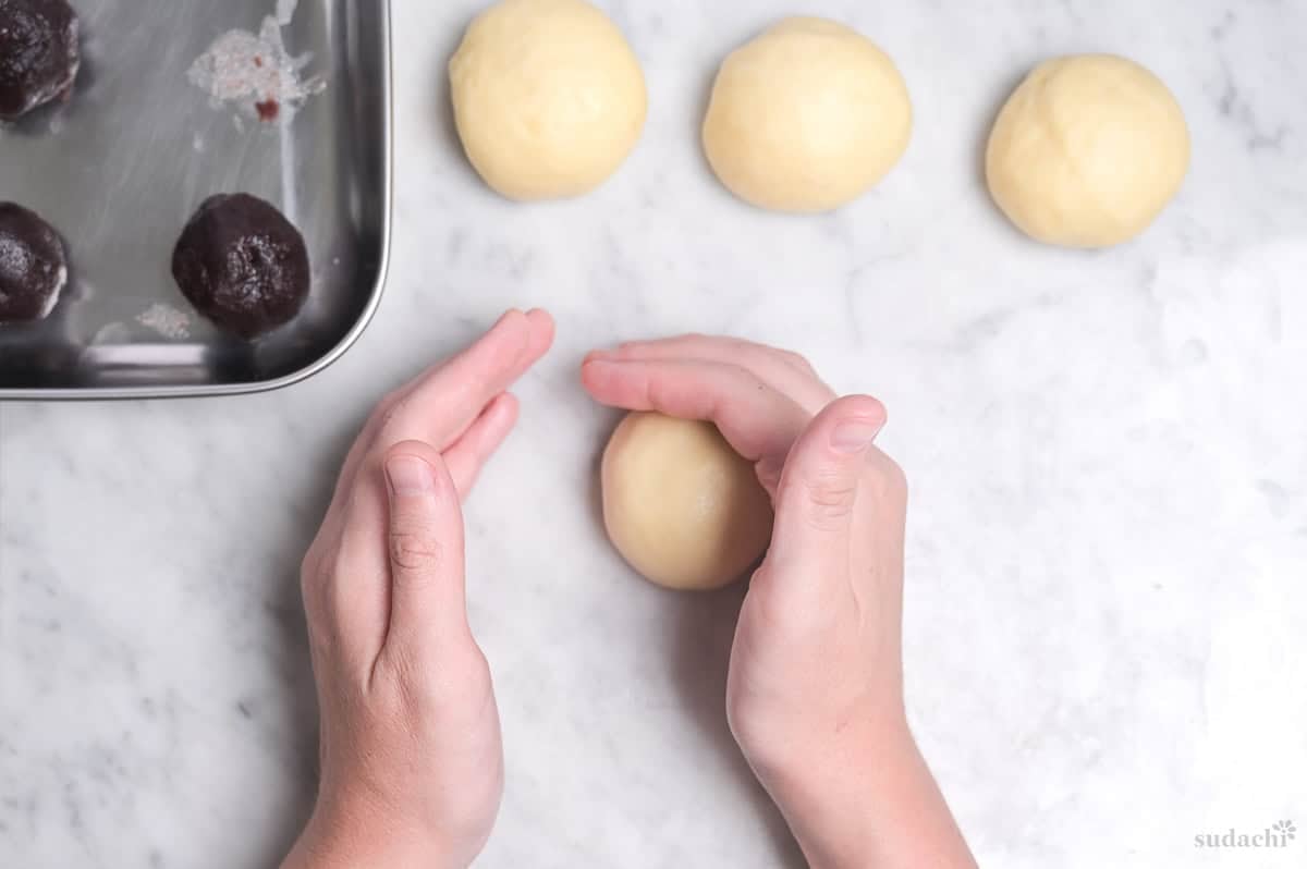 rolling dough to shape anpan