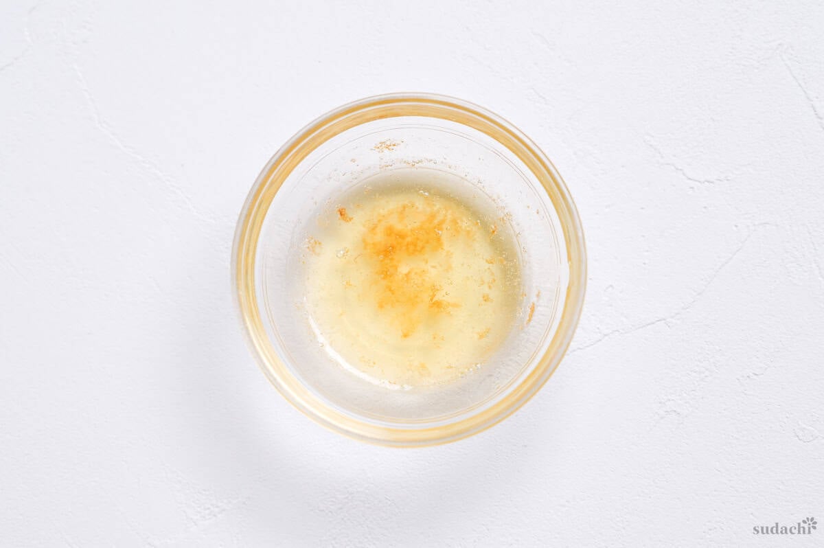 rendered duck fat in a small glass bowl