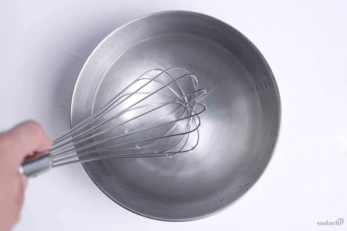 salt dissolved in water in a steel mixing bowl