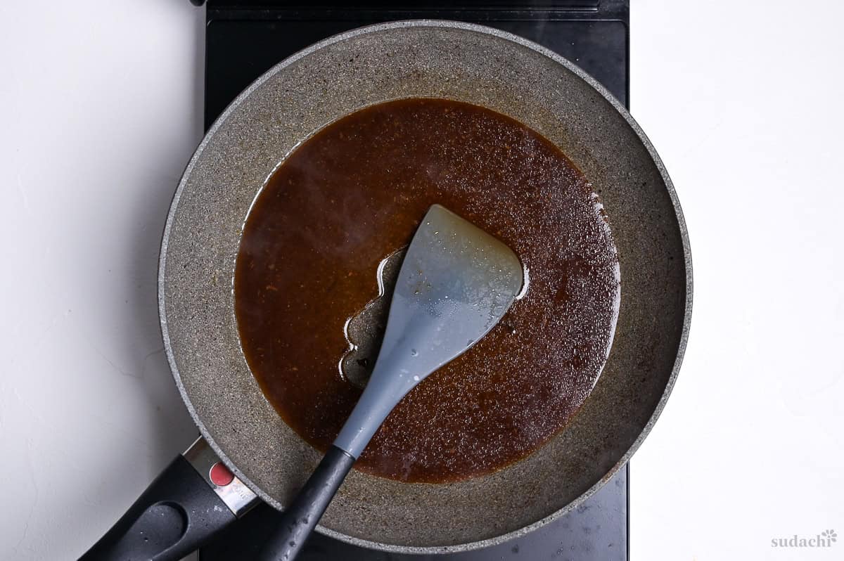 wafu hamburg sauce reduced in a frying pan on the stove top