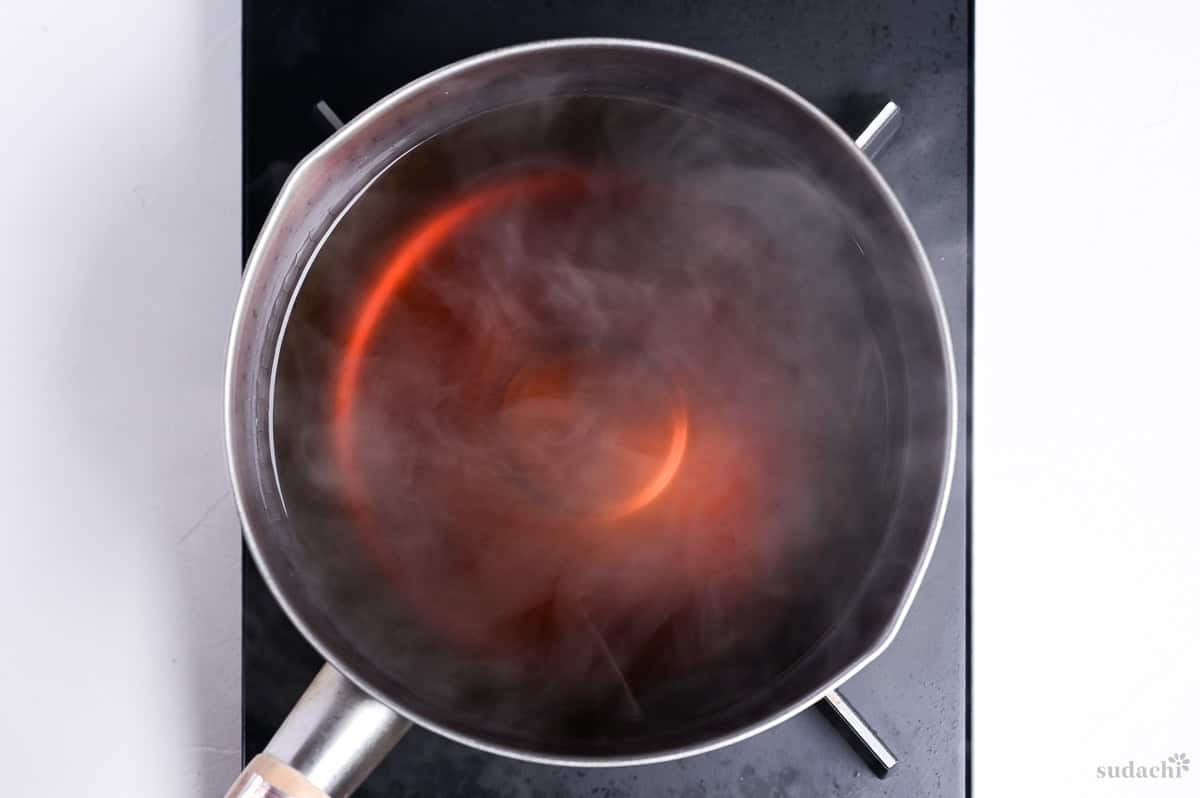 Udon noodle soup in a pot on the stove top