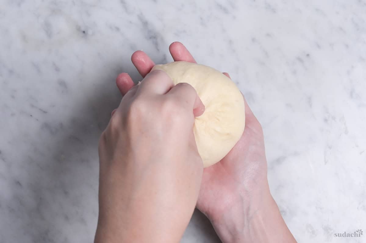 pinching dough to tighten