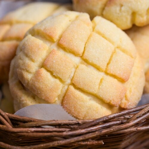 close up of homemade Japanese melon pan in a wicker basket
