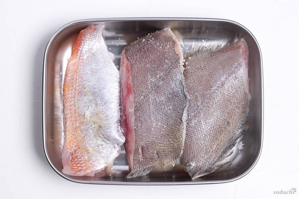 Flat fish fillets in a steel container (halibut)
