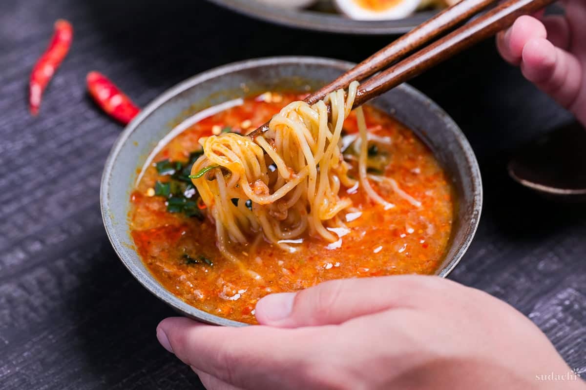 Spicy tsukemen dipping ramen in a blue bowl